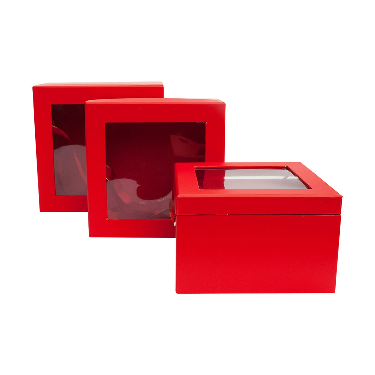 Three red gift boxes in different sizes stacked on each other